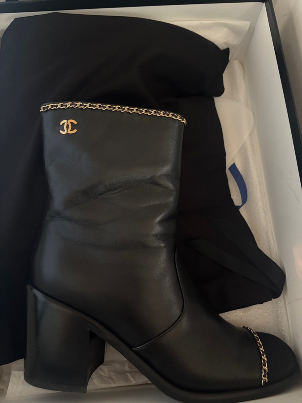 CHANEL Black Leather Mid-Calf Boots with Gold Chain Trim